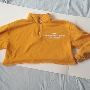 Cropped yellow O-ring quarter zip